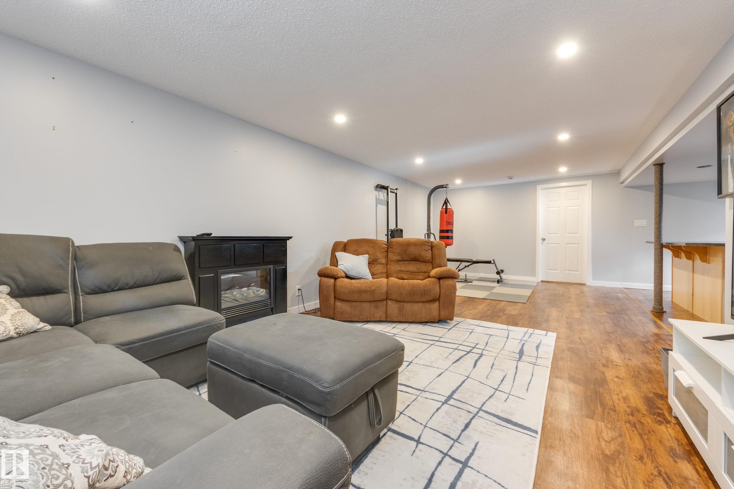 14227 74 Street, Edmonton, AB - Indoor Photo Showing Living Room With Fireplace
