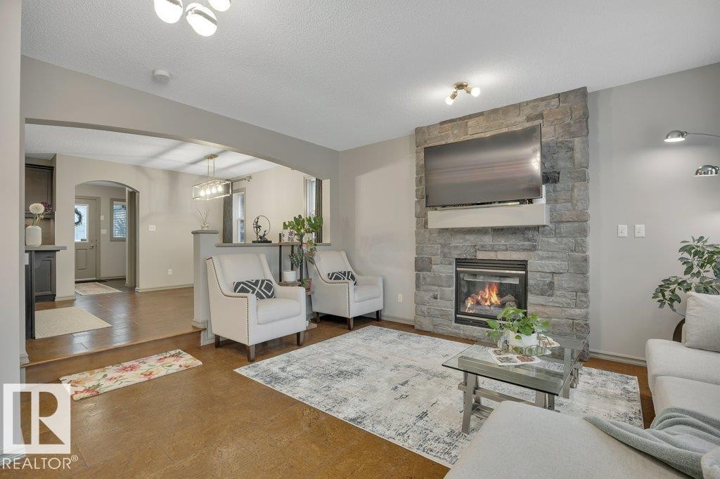 With Gas Fireplace - 1611 63 Street, Edmonton, AB - Indoor Photo Showing Living Room With Fireplace