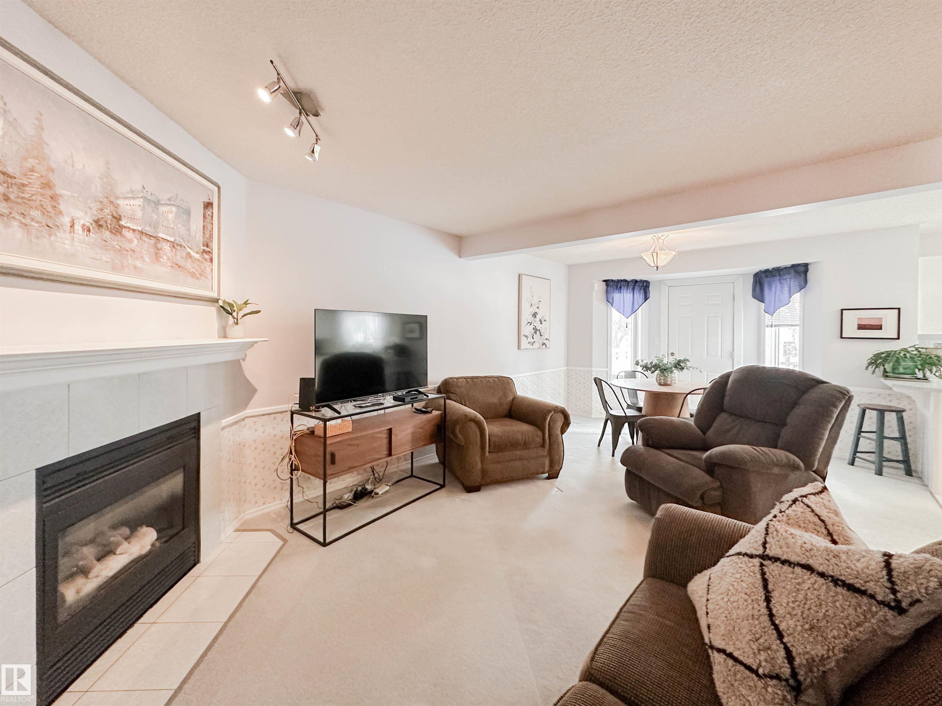 3 10 Devon Close, St. Albert, AB - Indoor Photo Showing Living Room With Fireplace
