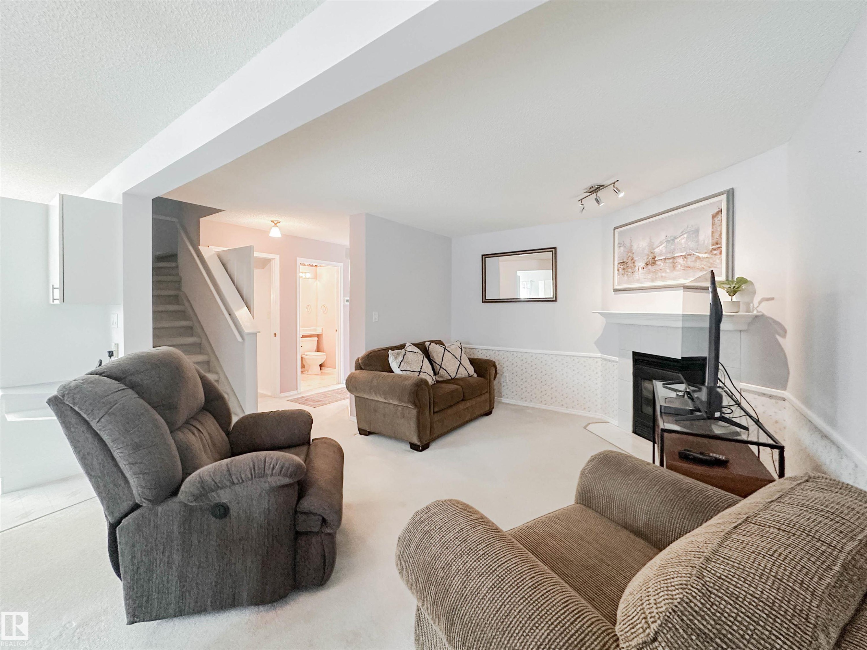 3 10 Devon Close, St. Albert, AB - Indoor Photo Showing Living Room With Fireplace