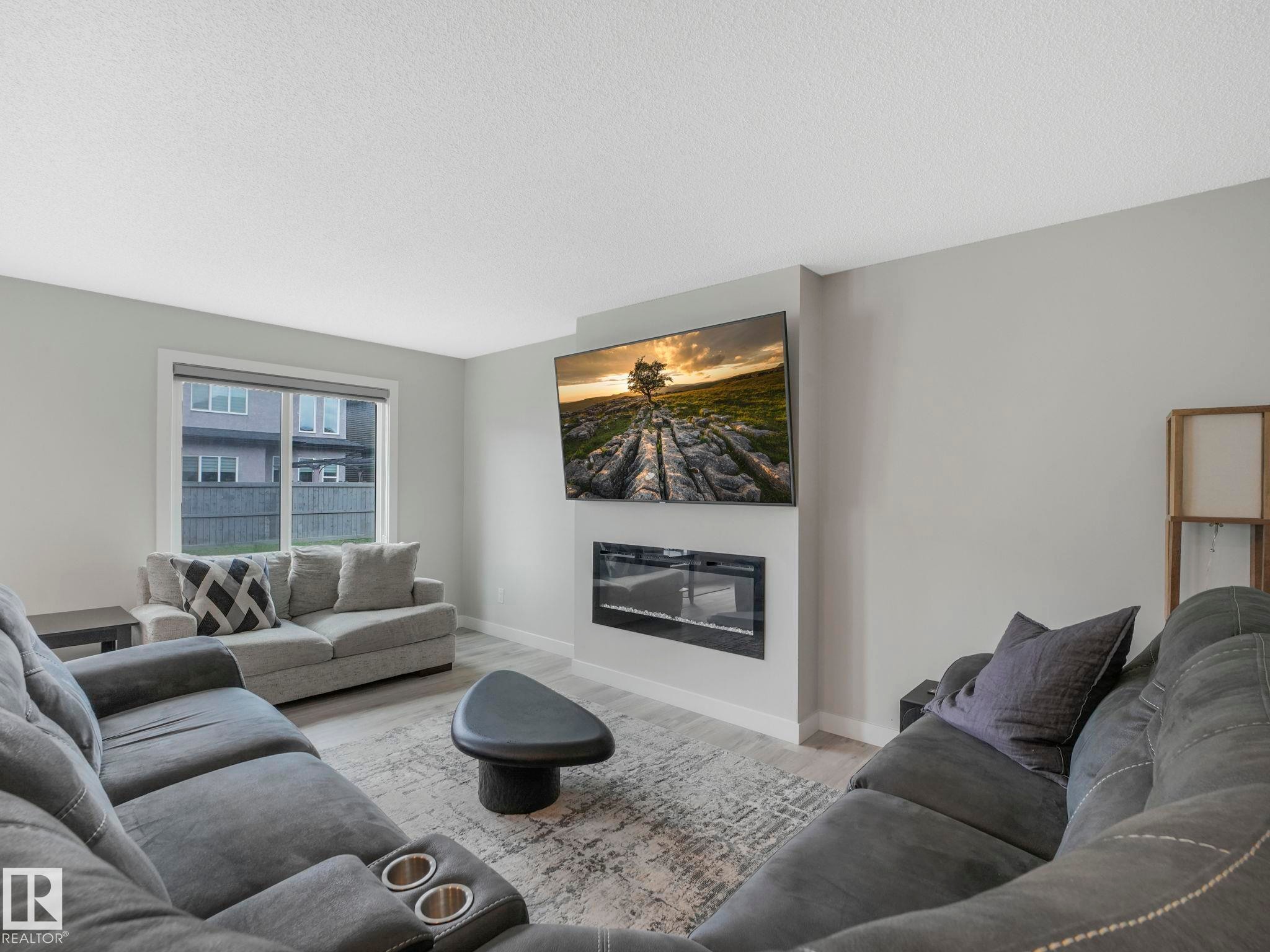 7808 174 Avenue, Edmonton, AB - Indoor Photo Showing Living Room With Fireplace