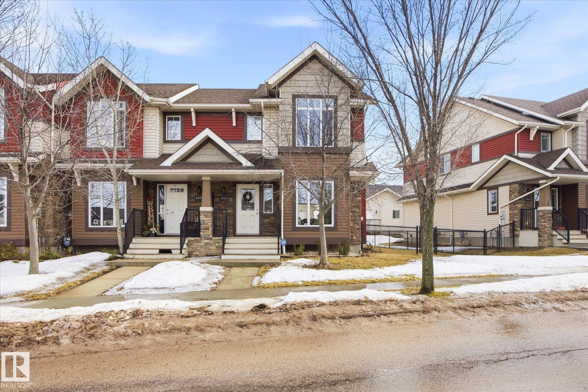 2061 Trumpeter Way, Edmonton, AB - Outdoor With Facade