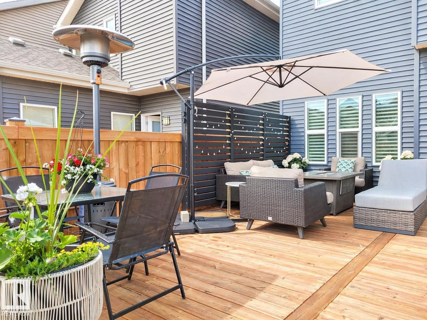 Expansive wood-finish deck with a privacy fence - 3278 Cherry Crescent, Edmonton, AB - Outdoor With Deck Patio Veranda With Exterior