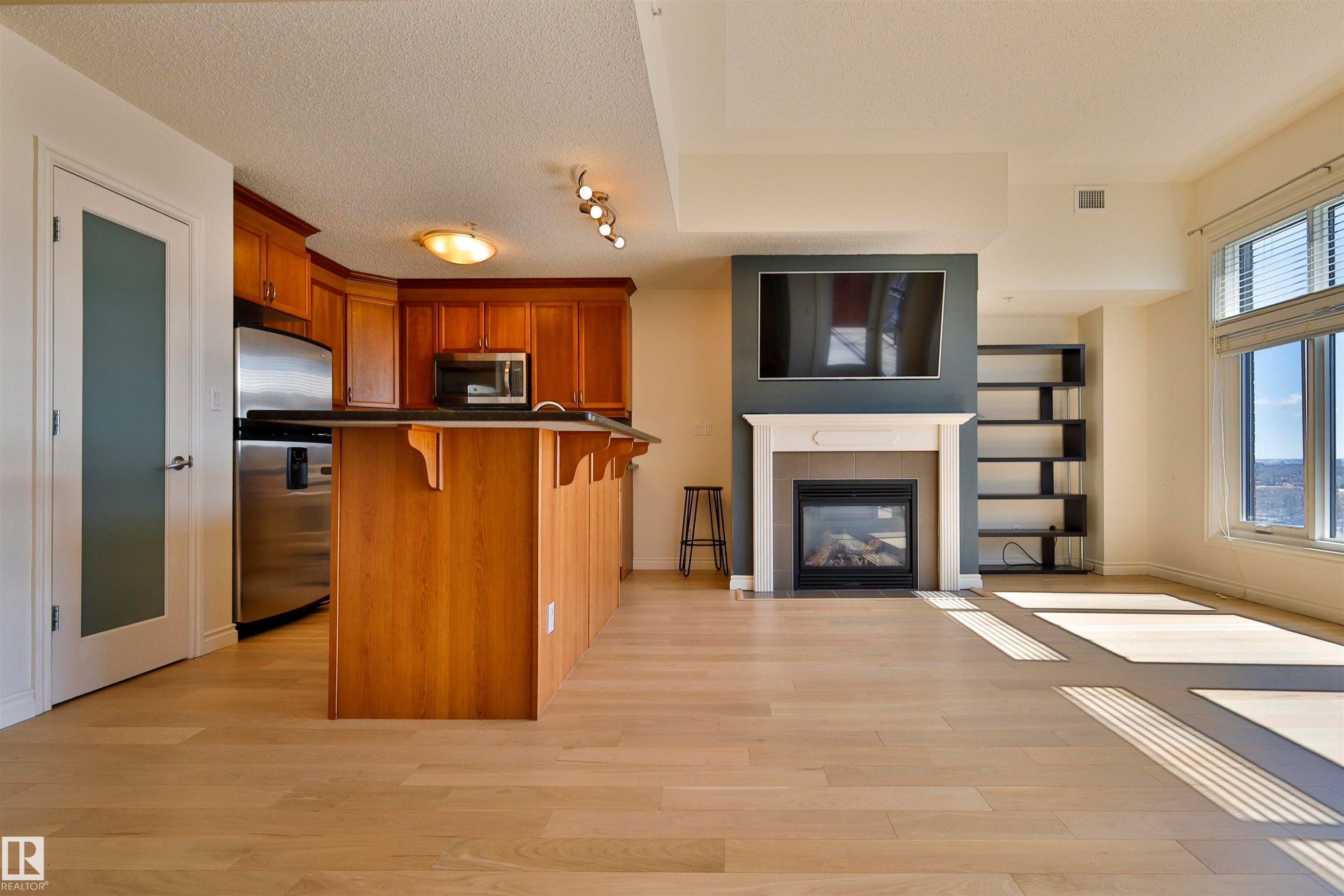 906 9020 Jasper Avenue, Edmonton, AB - Indoor With Fireplace