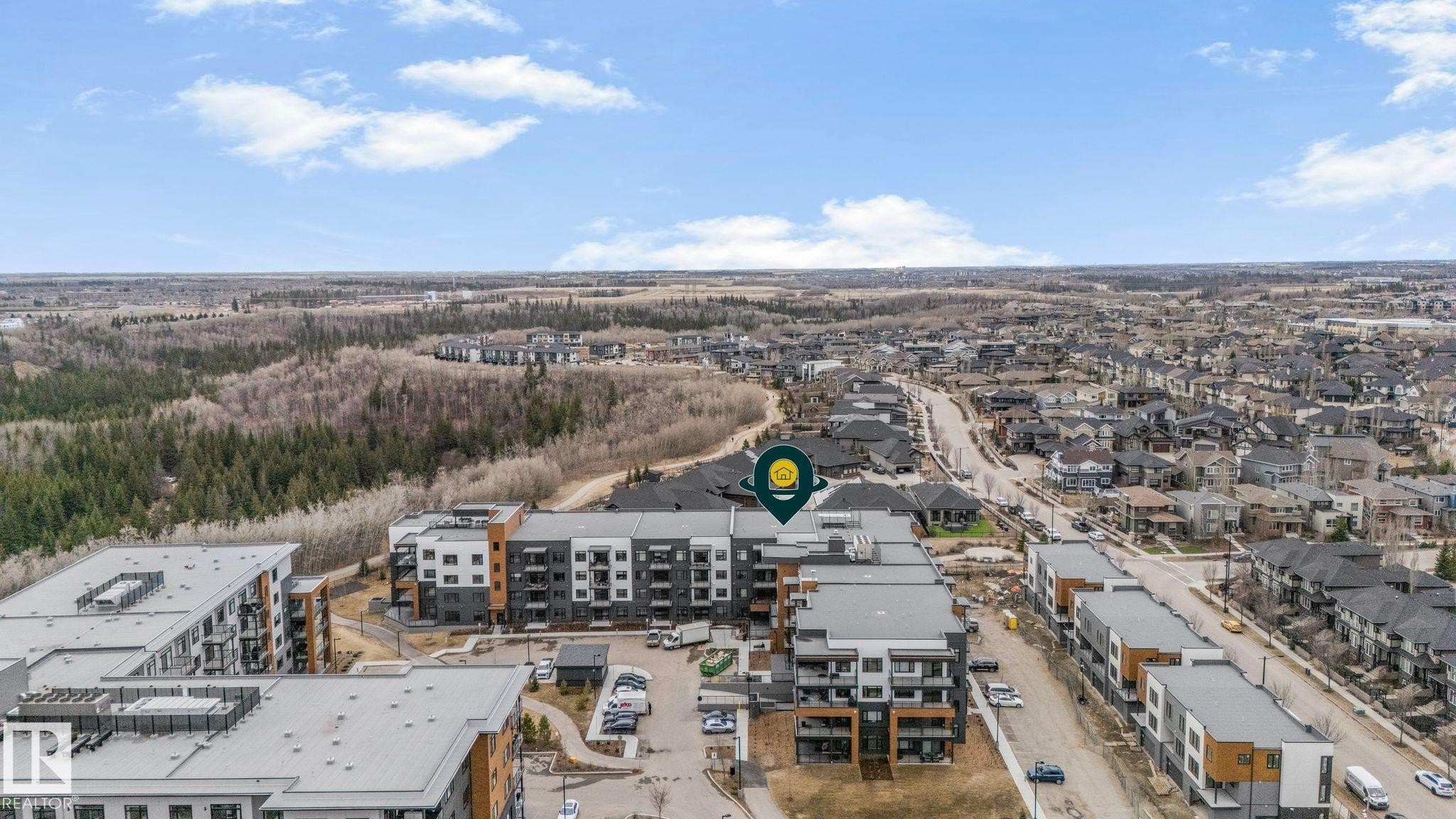 Image quality insufficient for description - 202 7459 May Common, Edmonton, AB - Outdoor With View