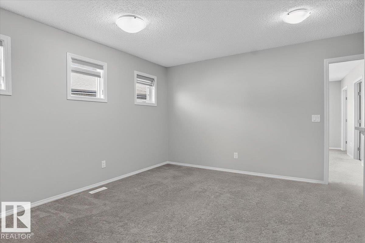 9046 Cooper Link, Edmonton, AB - Indoor Photo Showing Other Room