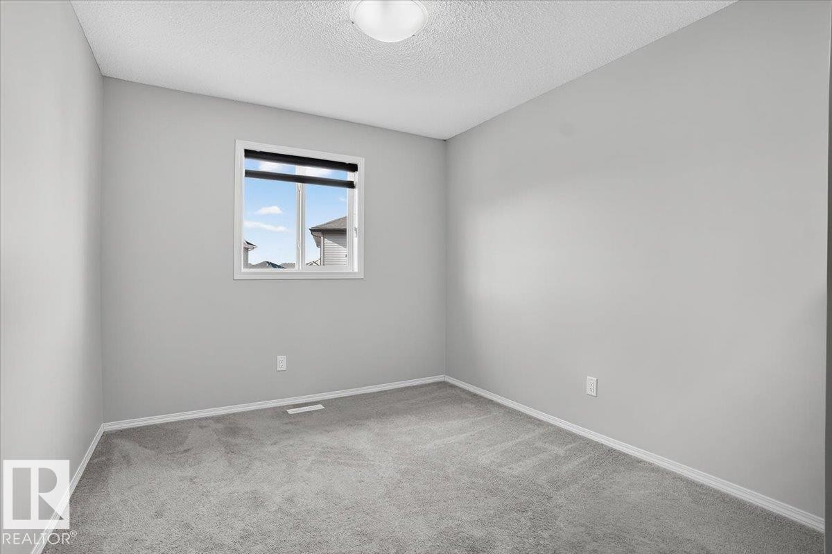 9046 Cooper Link, Edmonton, AB - Indoor Photo Showing Other Room