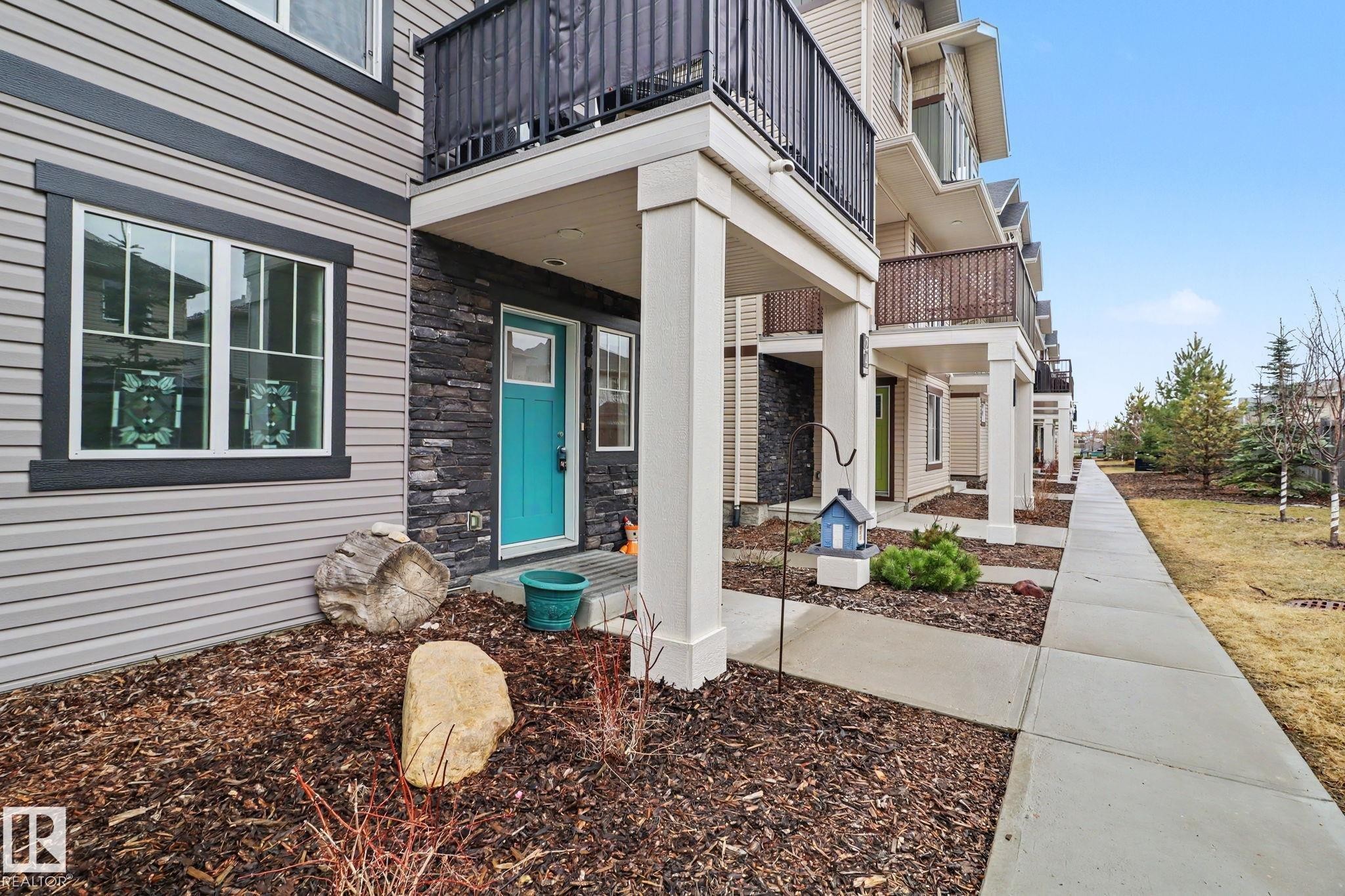 24 165 Cy Becker Blvd, Edmonton, AB - Outdoor With Facade