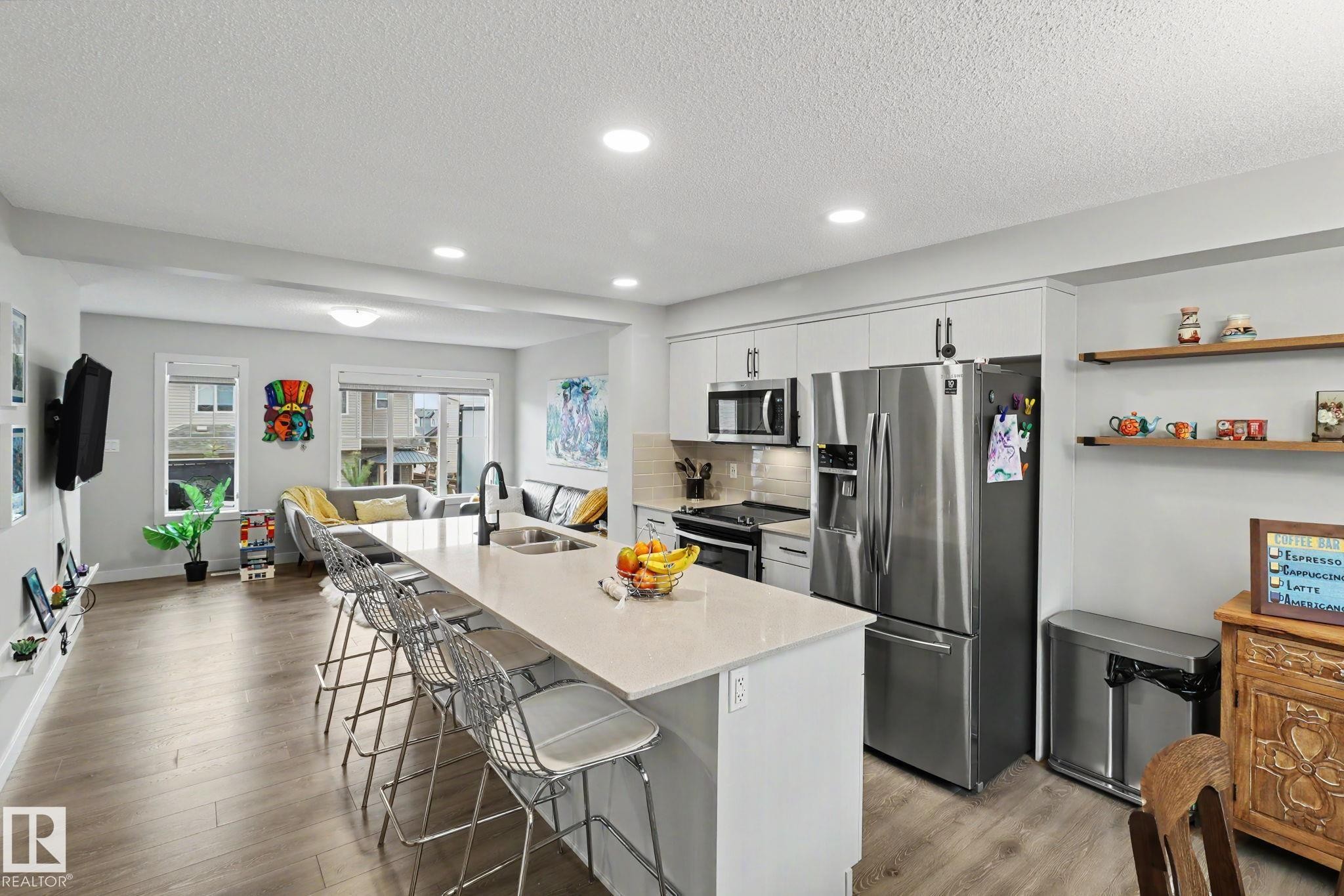 24 165 Cy Becker Blvd, Edmonton, AB - Indoor Photo Showing Kitchen With Stainless Steel Kitchen With Double Sink