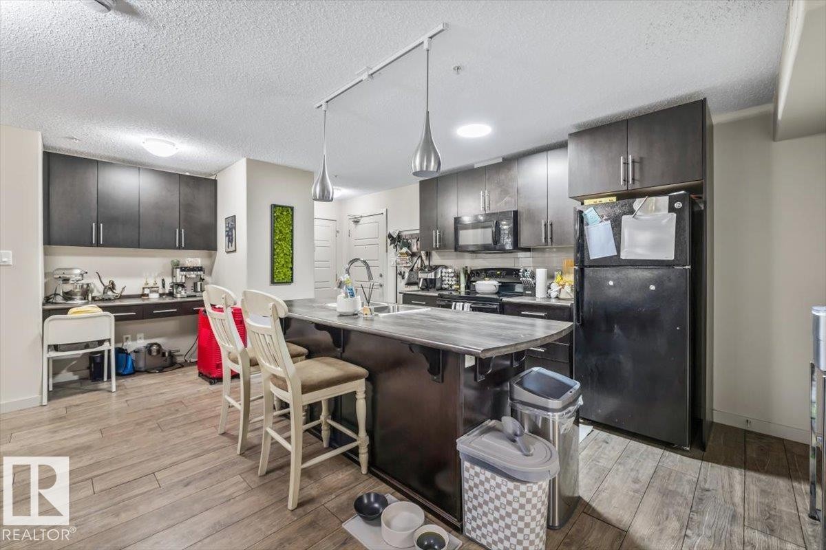 113 5510 Schonsee Drive, Edmonton, AB - Indoor Photo Showing Kitchen