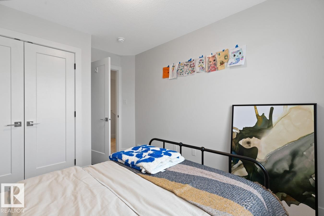Bright interior space with light-colored walls - 6023 180 Avenue, Edmonton, AB - Indoor Photo Showing Bedroom