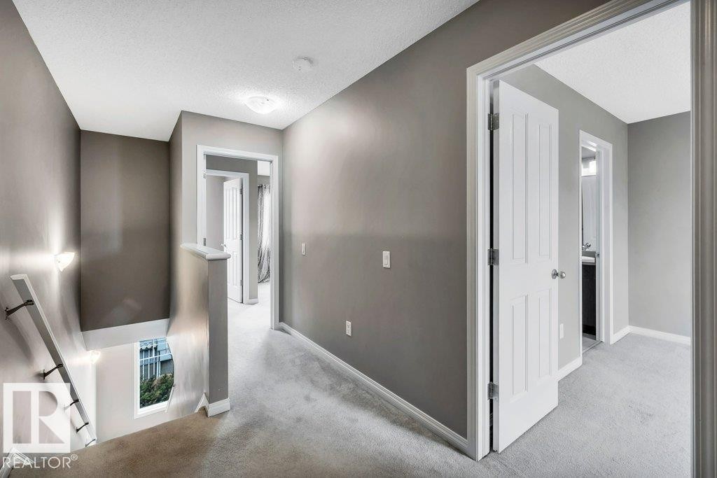 24 4050 Savaryn Drive, Edmonton, AB - Indoor Photo Showing Other Room