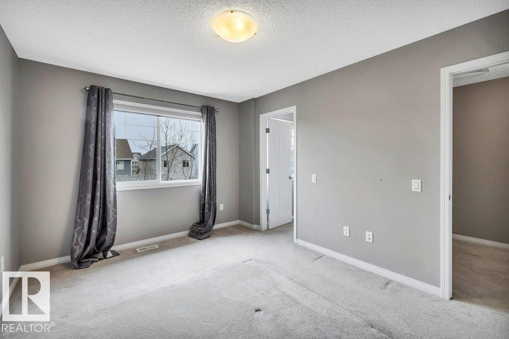 24 4050 Savaryn Drive, Edmonton, AB - Indoor Photo Showing Other Room