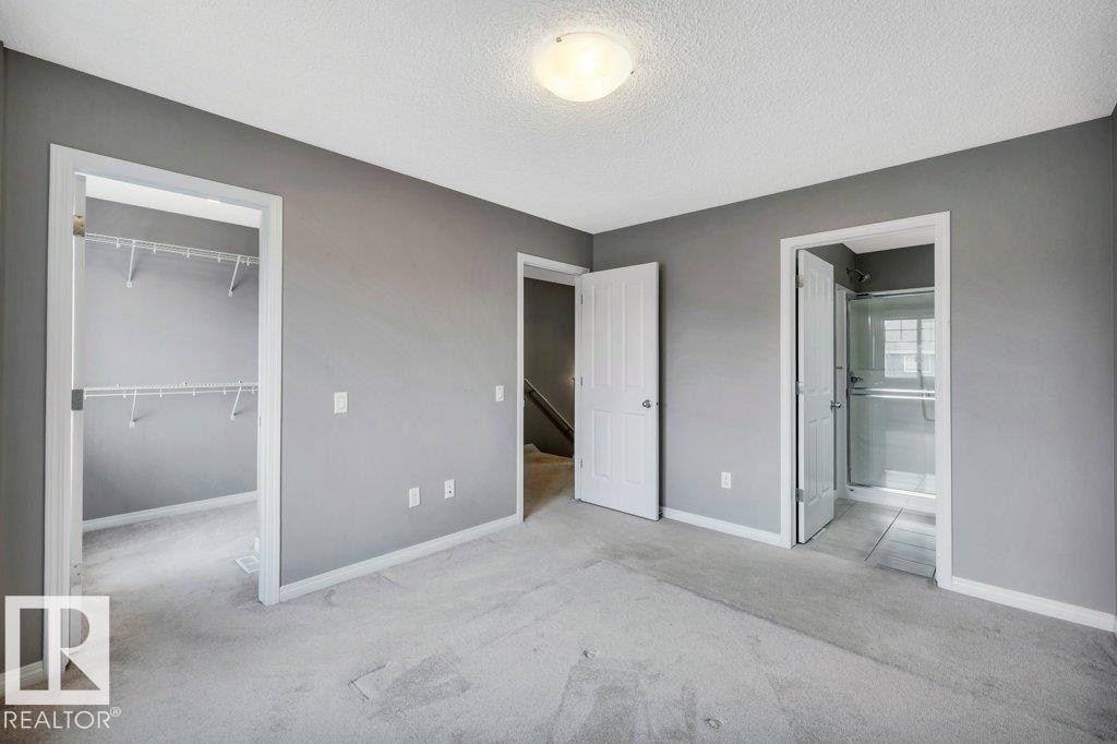 24 4050 Savaryn Drive, Edmonton, AB - Indoor Photo Showing Other Room