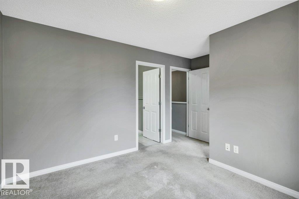 24 4050 Savaryn Drive, Edmonton, AB - Indoor Photo Showing Other Room