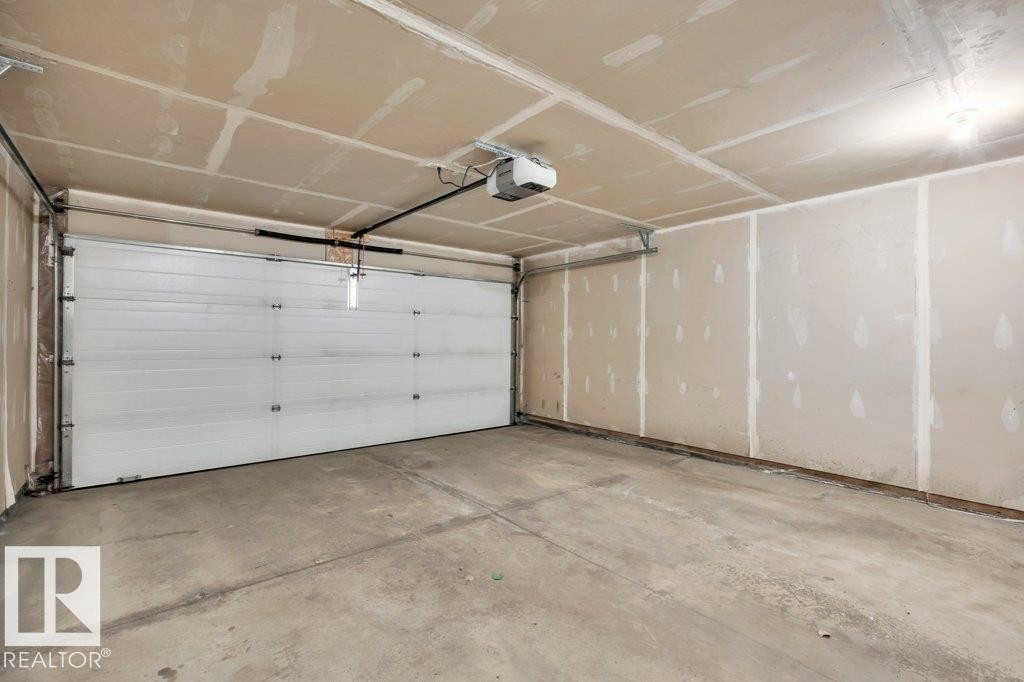 24 4050 Savaryn Drive, Edmonton, AB - Indoor Photo Showing Garage