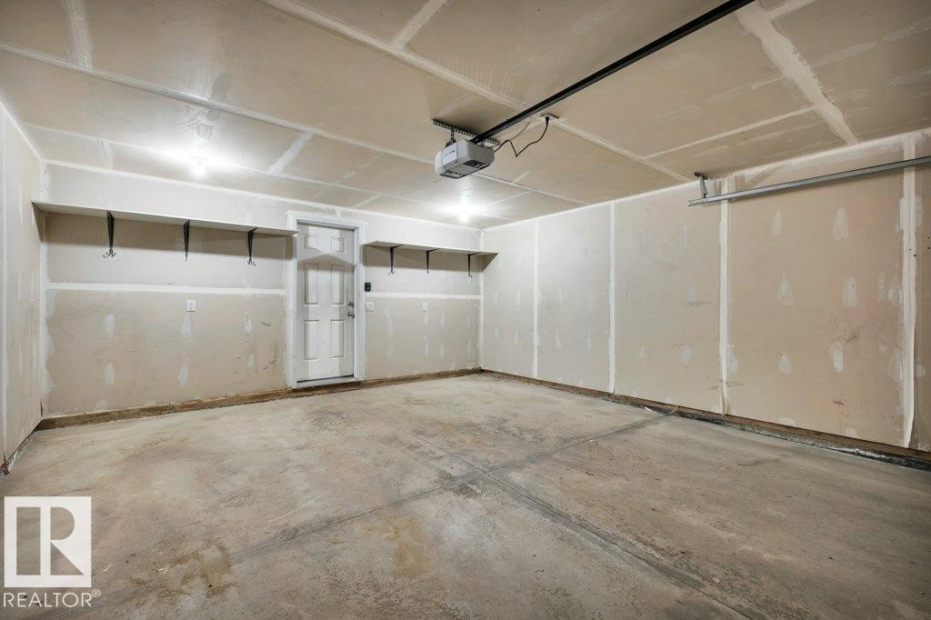 24 4050 Savaryn Drive, Edmonton, AB - Indoor Photo Showing Garage