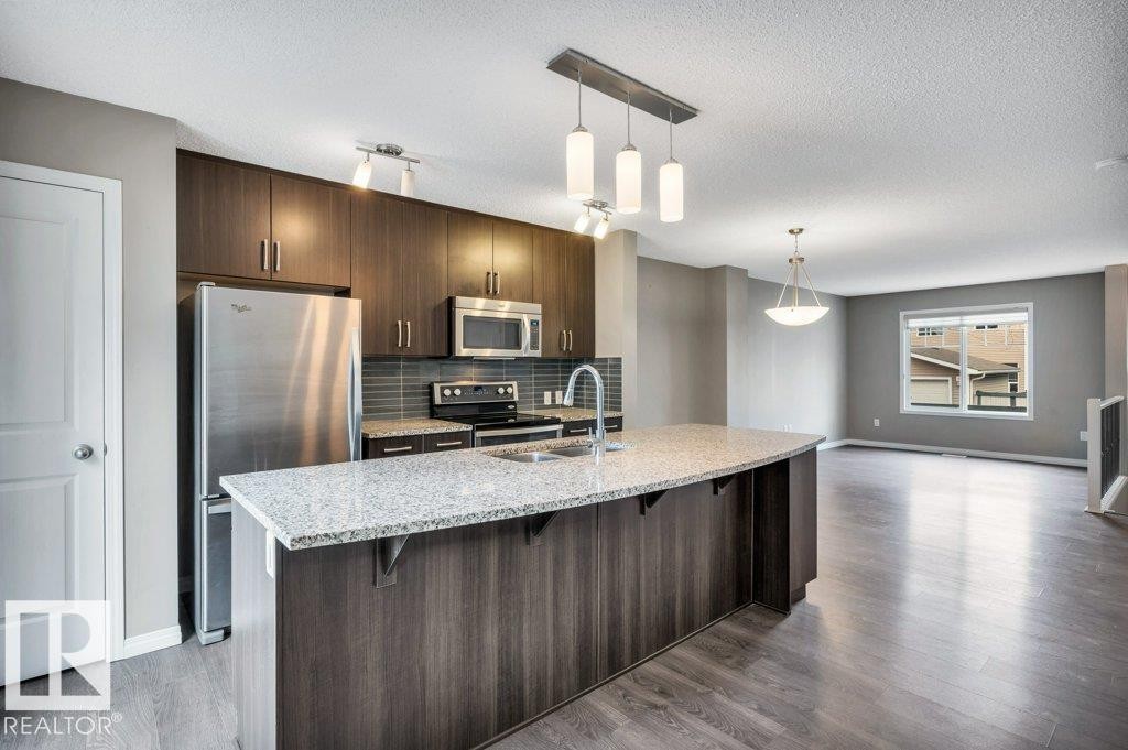 24 4050 Savaryn Drive, Edmonton, AB - Indoor Photo Showing Kitchen With Upgraded Kitchen