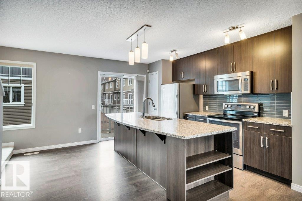 24 4050 Savaryn Drive, Edmonton, AB - Indoor Photo Showing Kitchen With Upgraded Kitchen