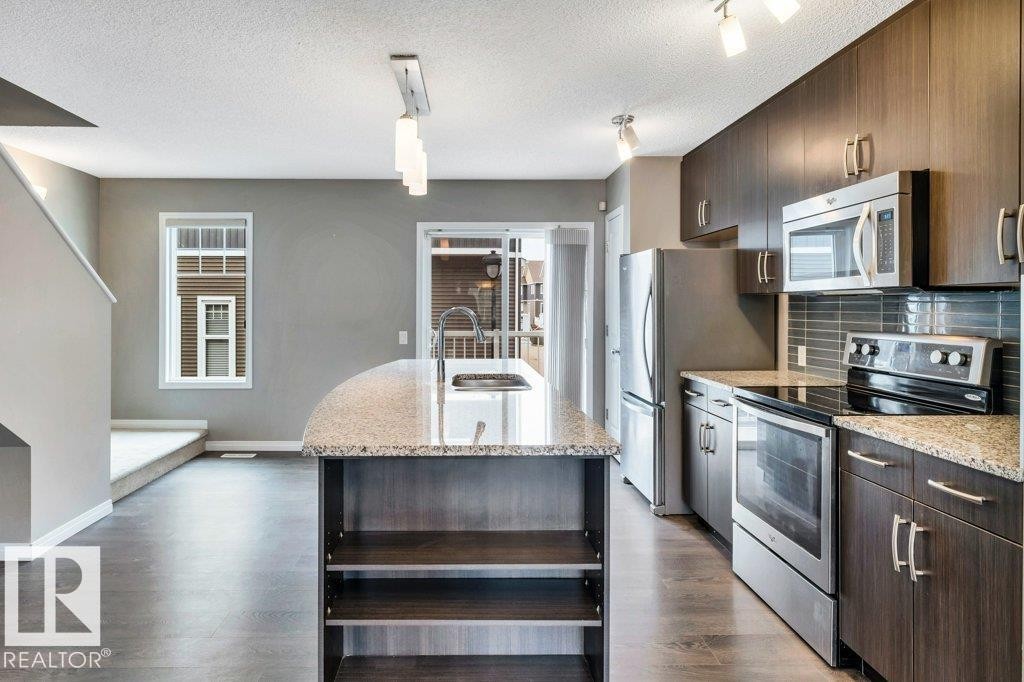 24 4050 Savaryn Drive, Edmonton, AB - Indoor Photo Showing Kitchen With Upgraded Kitchen