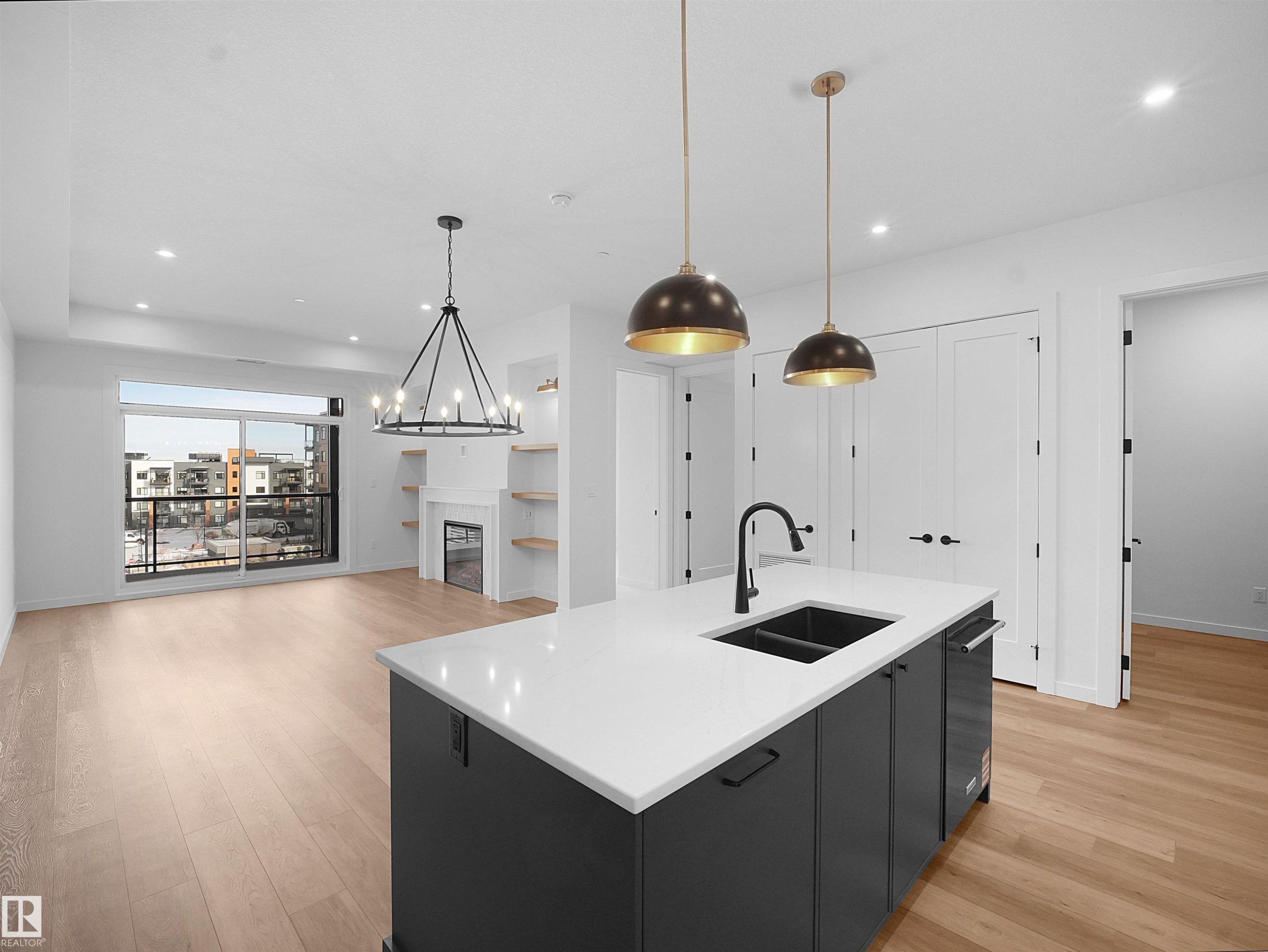 402 7459 May Common, Edmonton, AB - Indoor Photo Showing Kitchen With Double Sink With Upgraded Kitchen