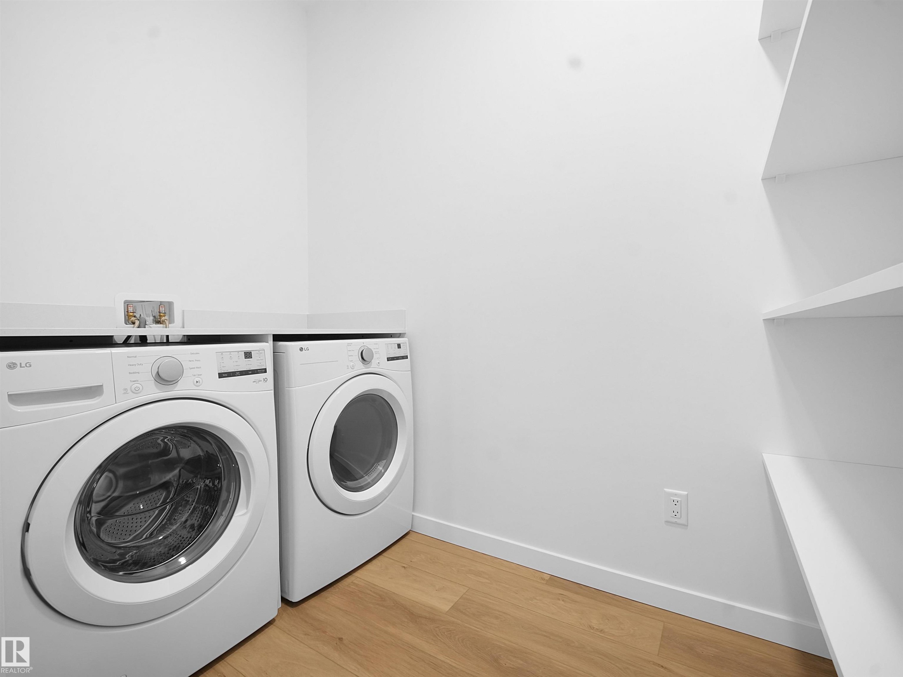 402 7459 May Common, Edmonton, AB - Indoor Photo Showing Laundry Room