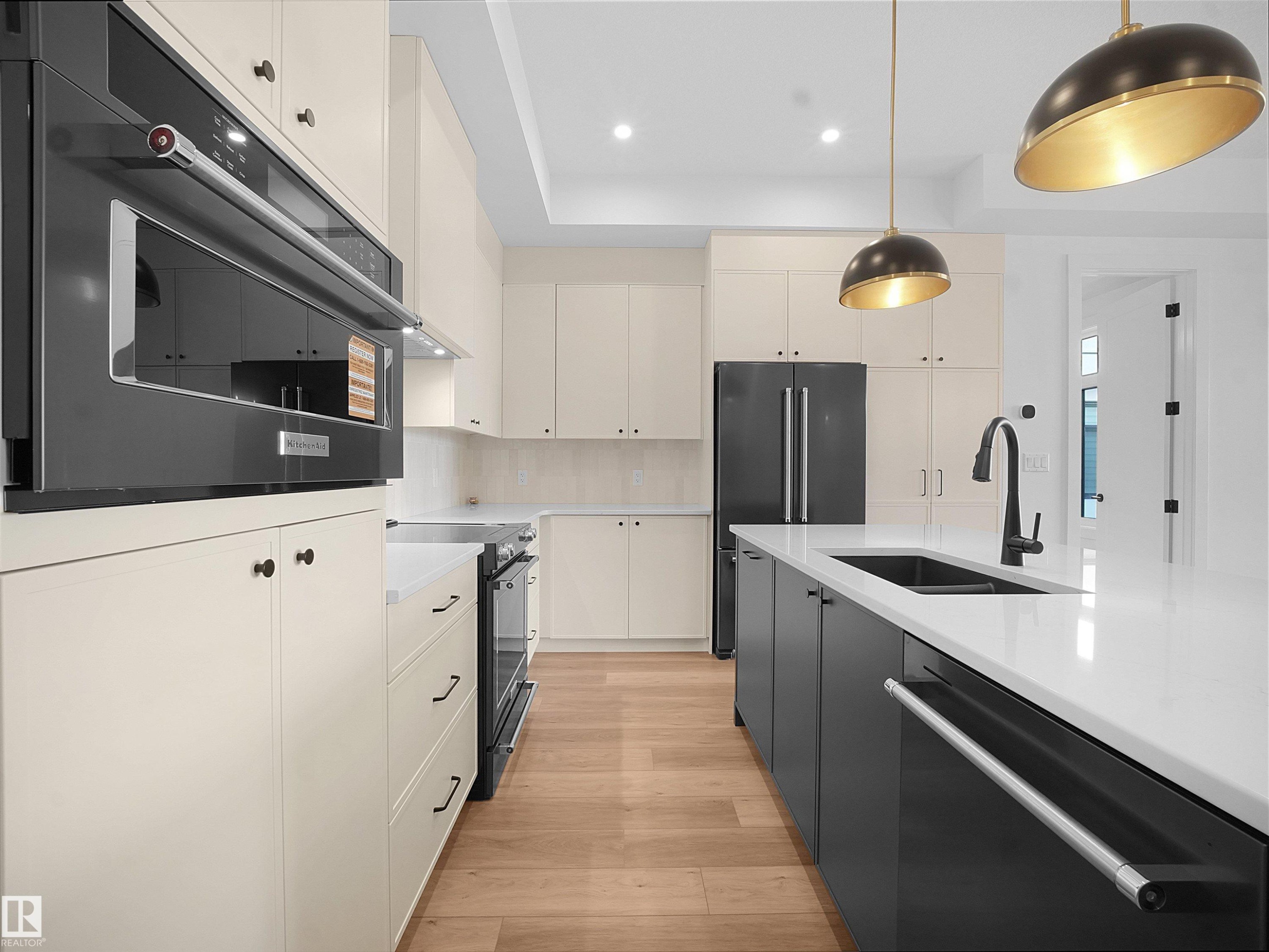 402 7459 May Common, Edmonton, AB - Indoor Photo Showing Kitchen With Double Sink With Upgraded Kitchen