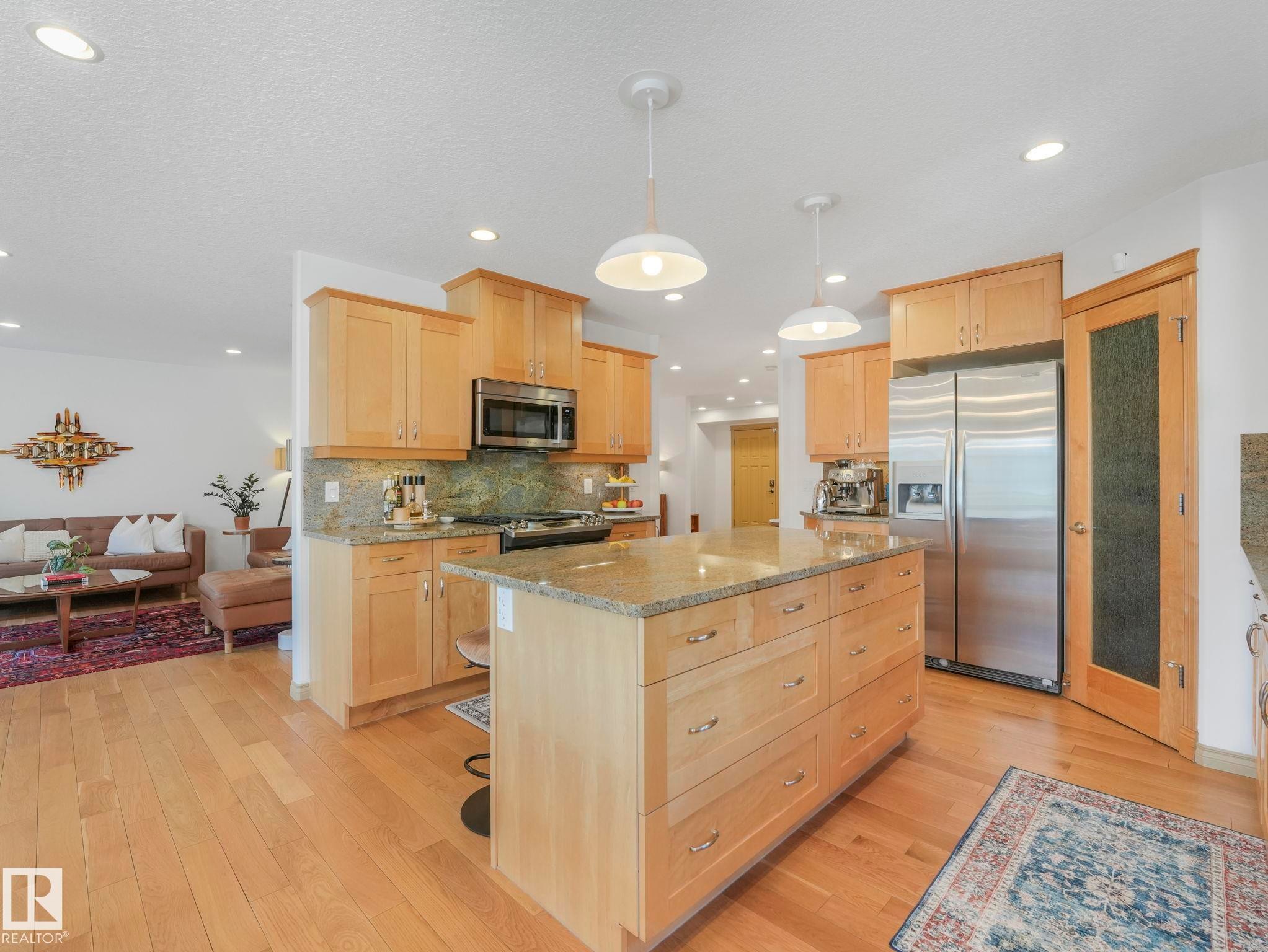 Large walk-in Corner Pantry - 8723 207 Street Nw, Edmonton, AB - Indoor Photo Showing Kitchen