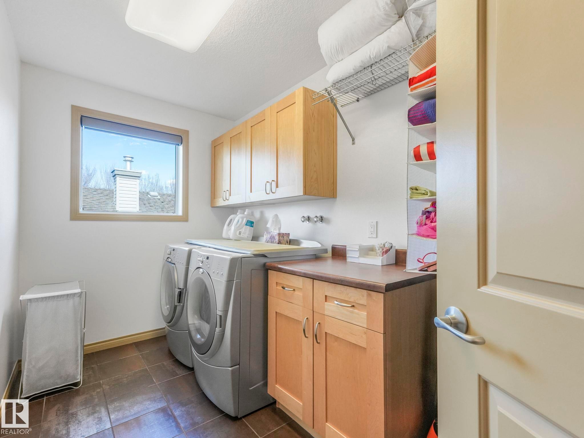 Upper level laundry is a game changer! - 8723 207 Street Nw, Edmonton, AB - Indoor Photo Showing Laundry Room