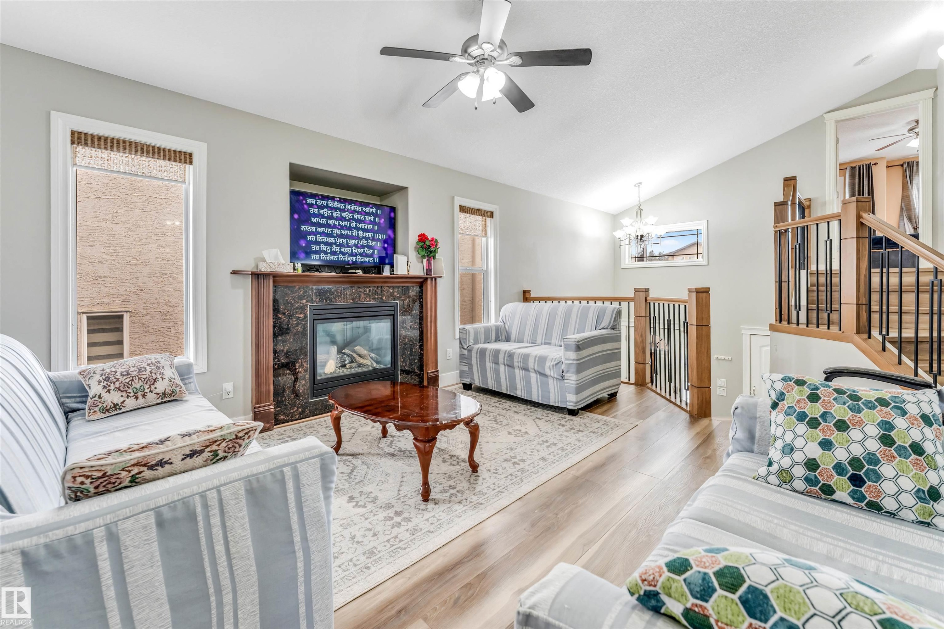 3228 18 St, Edmonton, AB - Indoor Photo Showing Living Room With Fireplace