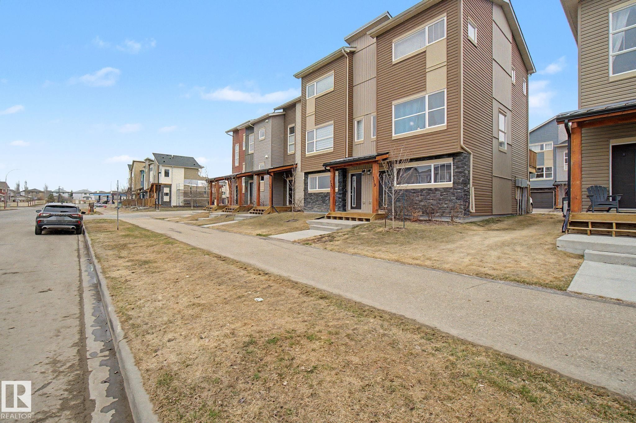 121 401 Southfork Drive, Leduc, AB - Outdoor With Facade