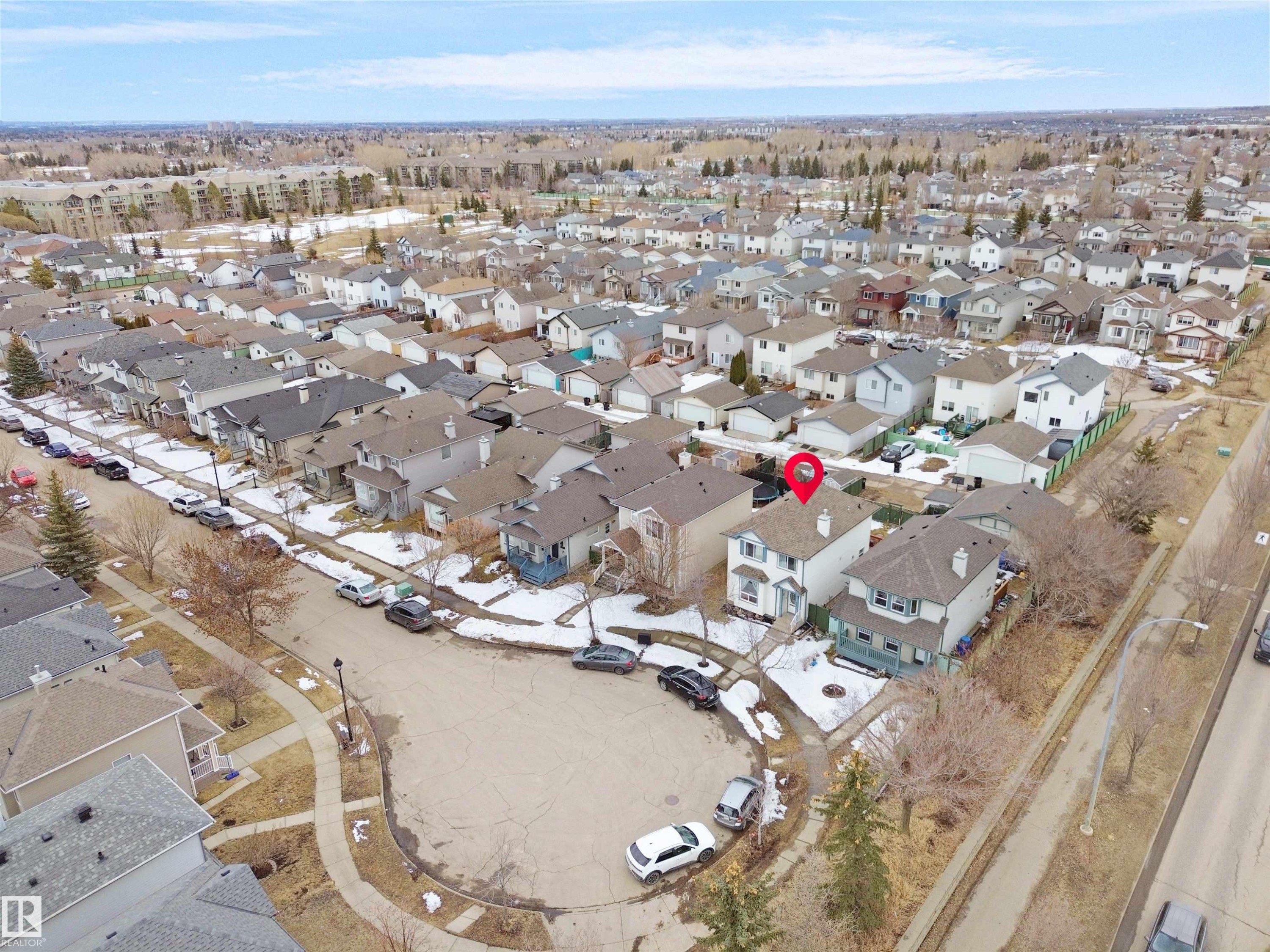 Residential property featuring a light-colored exterior, an asphalt shingle roof, and a front yard with minimal landscaping - 21379 89 Avenue Nw, Edmonton, AB - Outdoor With View