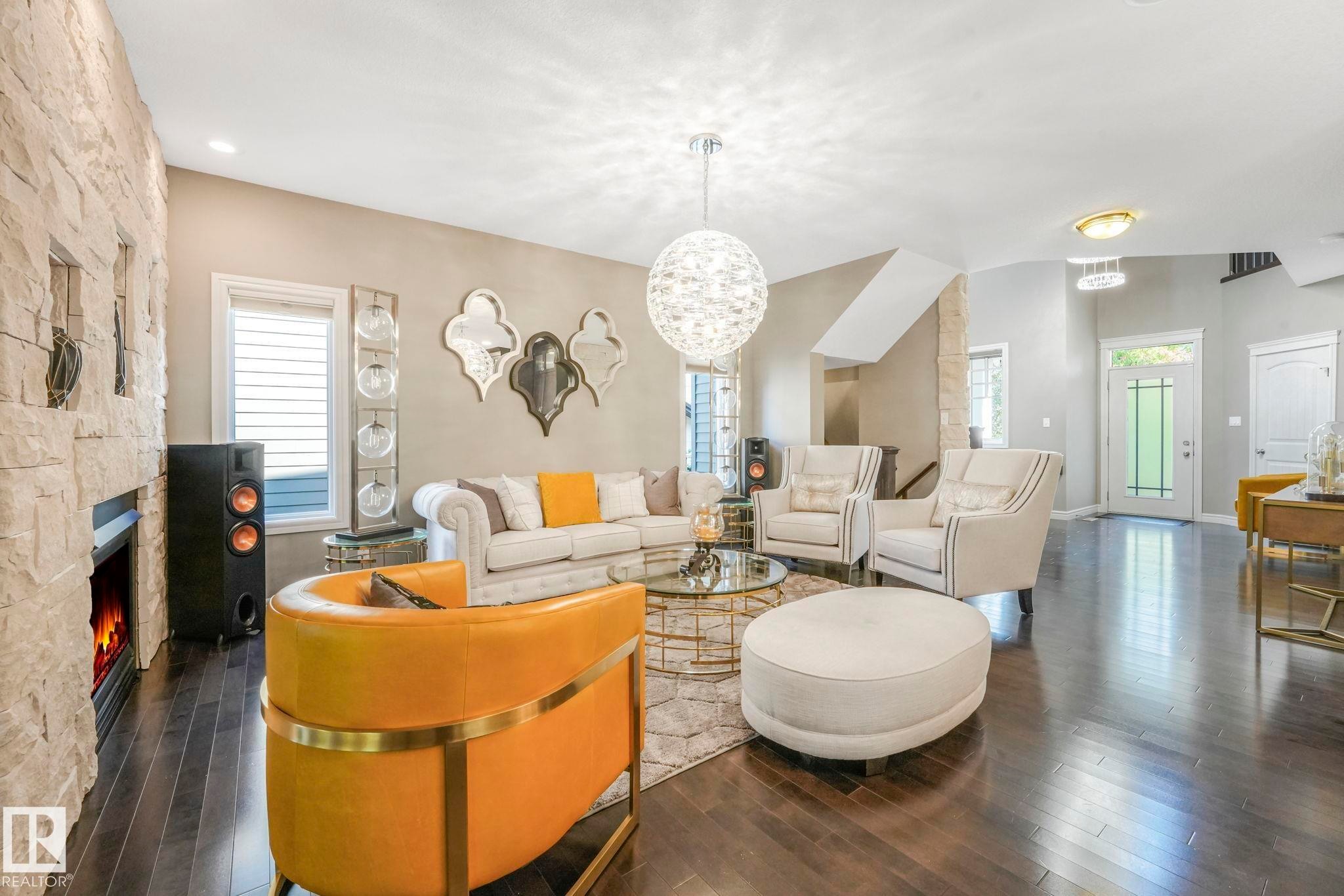 1232 Chahley Landing, Edmonton, AB - Indoor Photo Showing Living Room With Fireplace