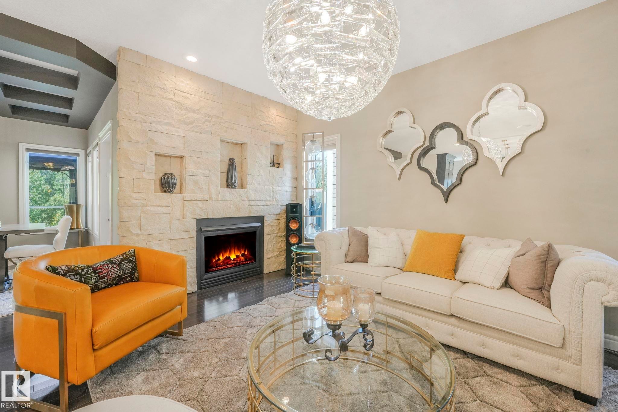 1232 Chahley Landing, Edmonton, AB - Indoor Photo Showing Living Room With Fireplace