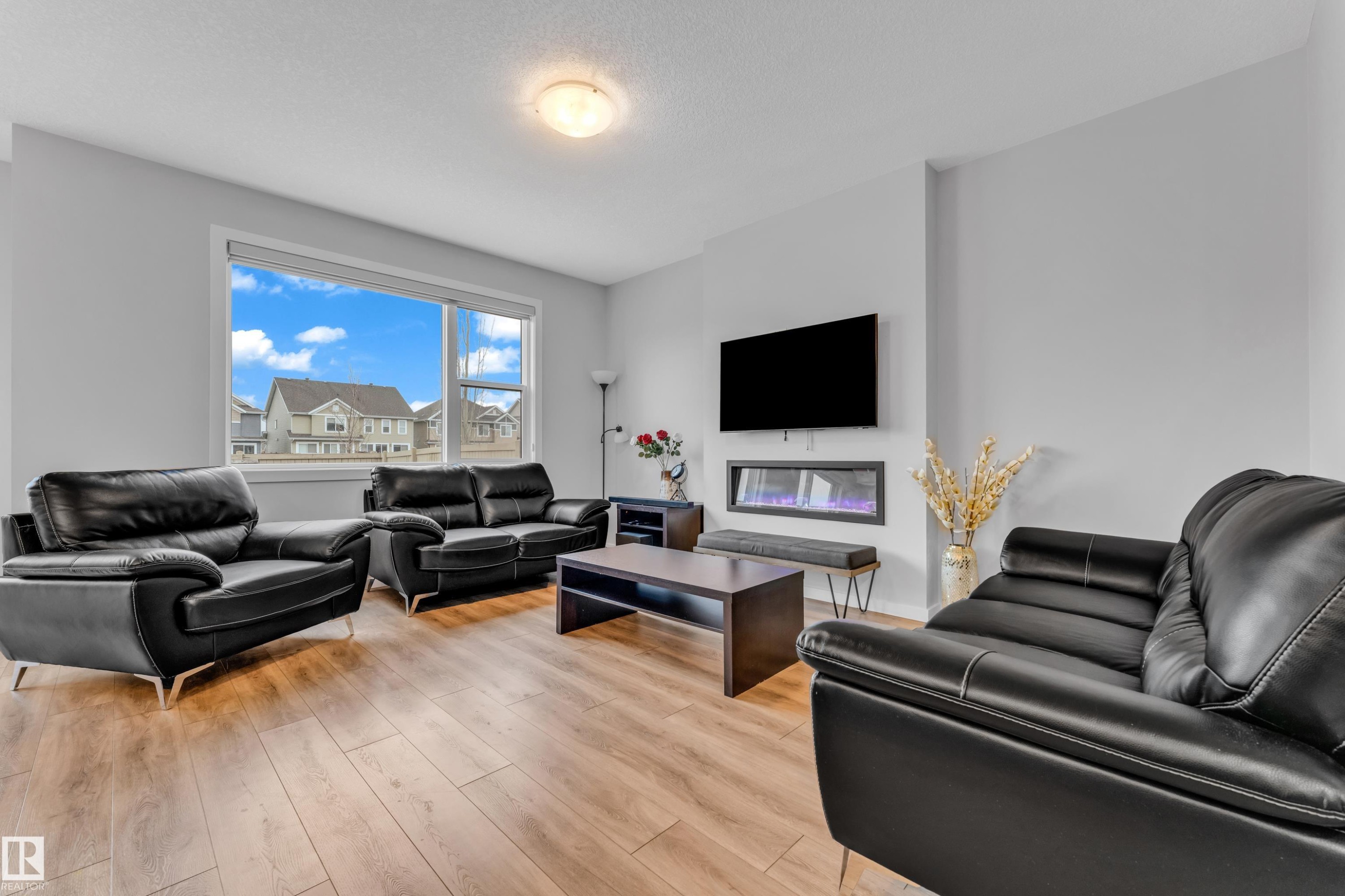3545 Cherry Landing, Edmonton, AB - Indoor Photo Showing Living Room With Fireplace