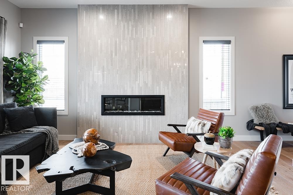 9389 Cooper Bend Bend, Edmonton, AB - Indoor Photo Showing Living Room With Fireplace