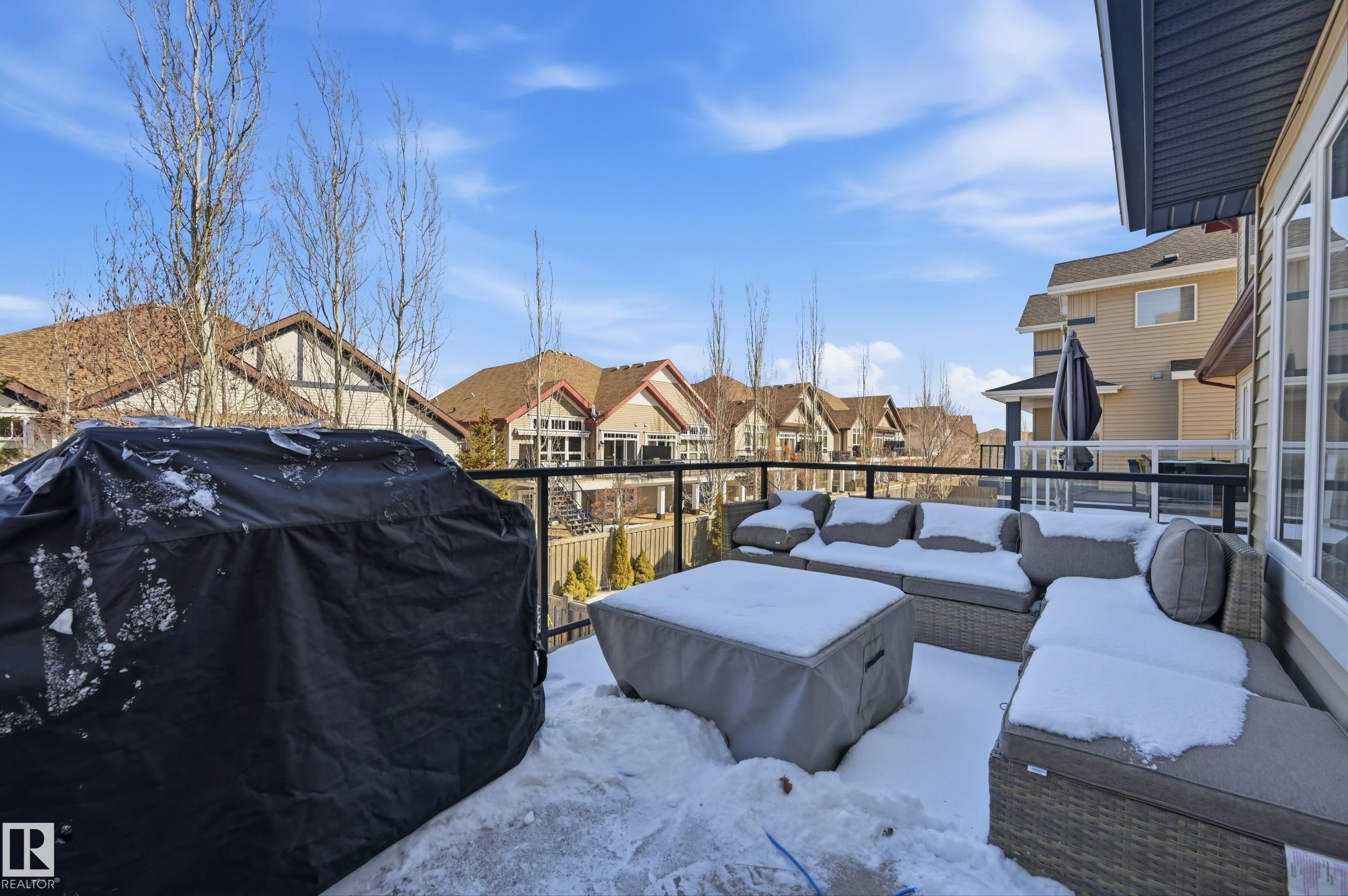 Outdoor patio featuring a glass railing and ample space for furnishings - 2018 Armitage Green, Edmonton, AB - Outdoor