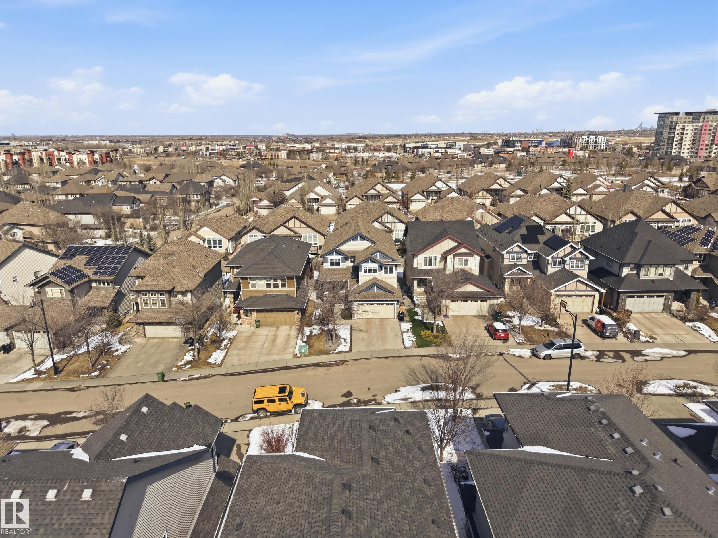This aerial view showcases the residential area, featuring properties with attached garages and driveways - 2018 Armitage Green, Edmonton, AB - Outdoor With View
