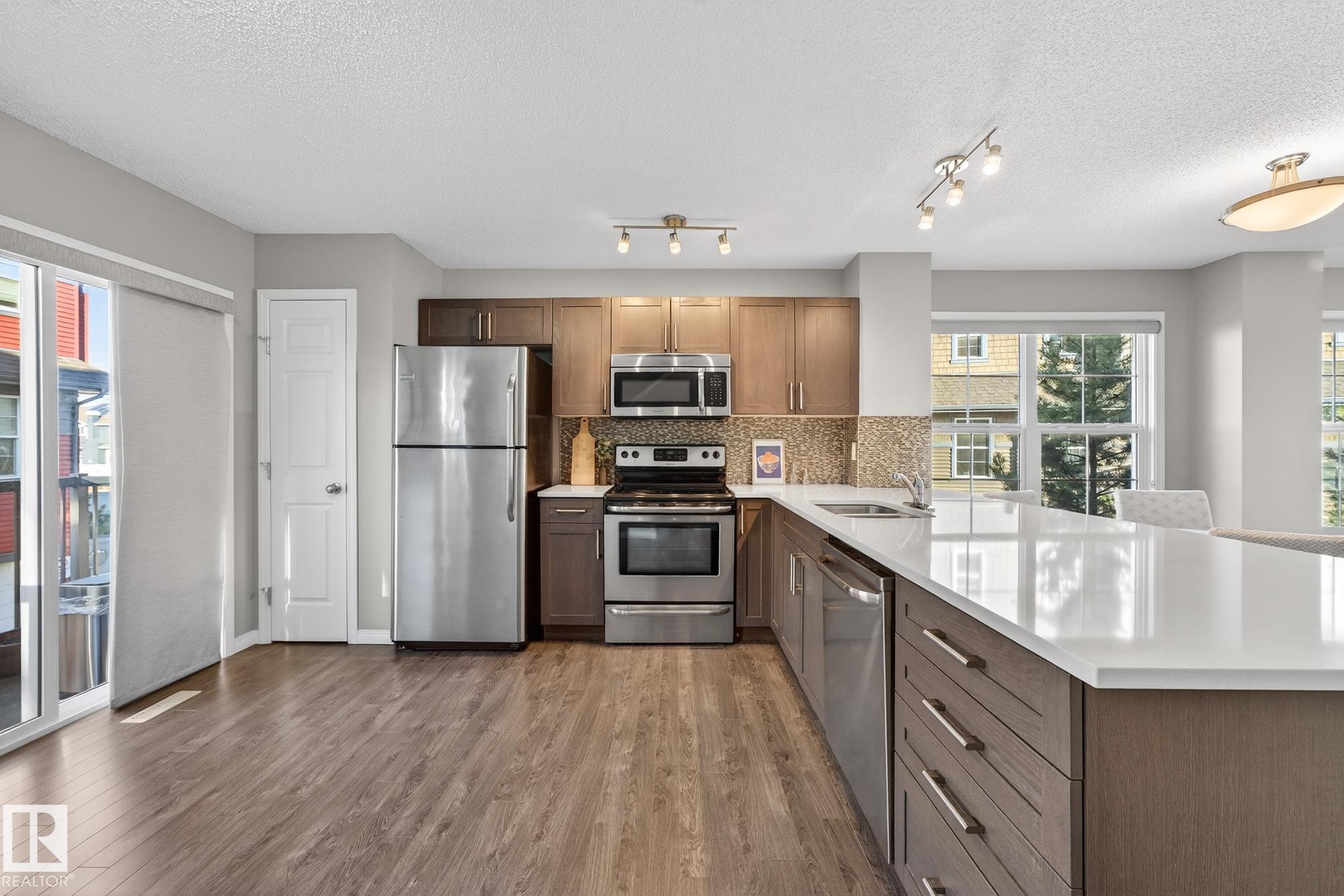 17 4029 Orchards Drive, Edmonton, AB - Indoor Photo Showing Kitchen With Stainless Steel Kitchen