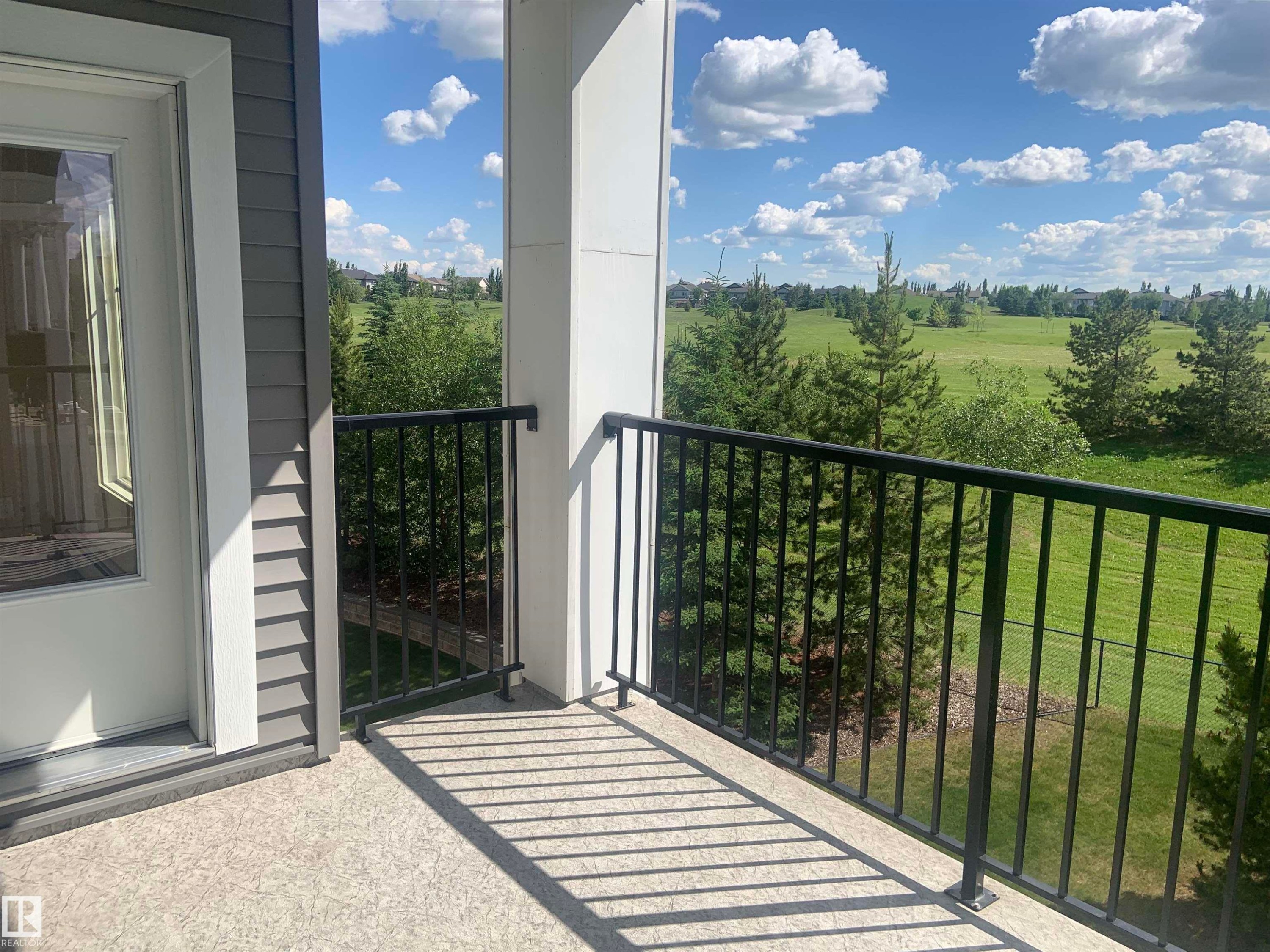 Private balcony featuring concrete flooring and black metal railings - 307 6084 Stanton Drive, Edmonton, AB - Outdoor With Balcony With Exterior