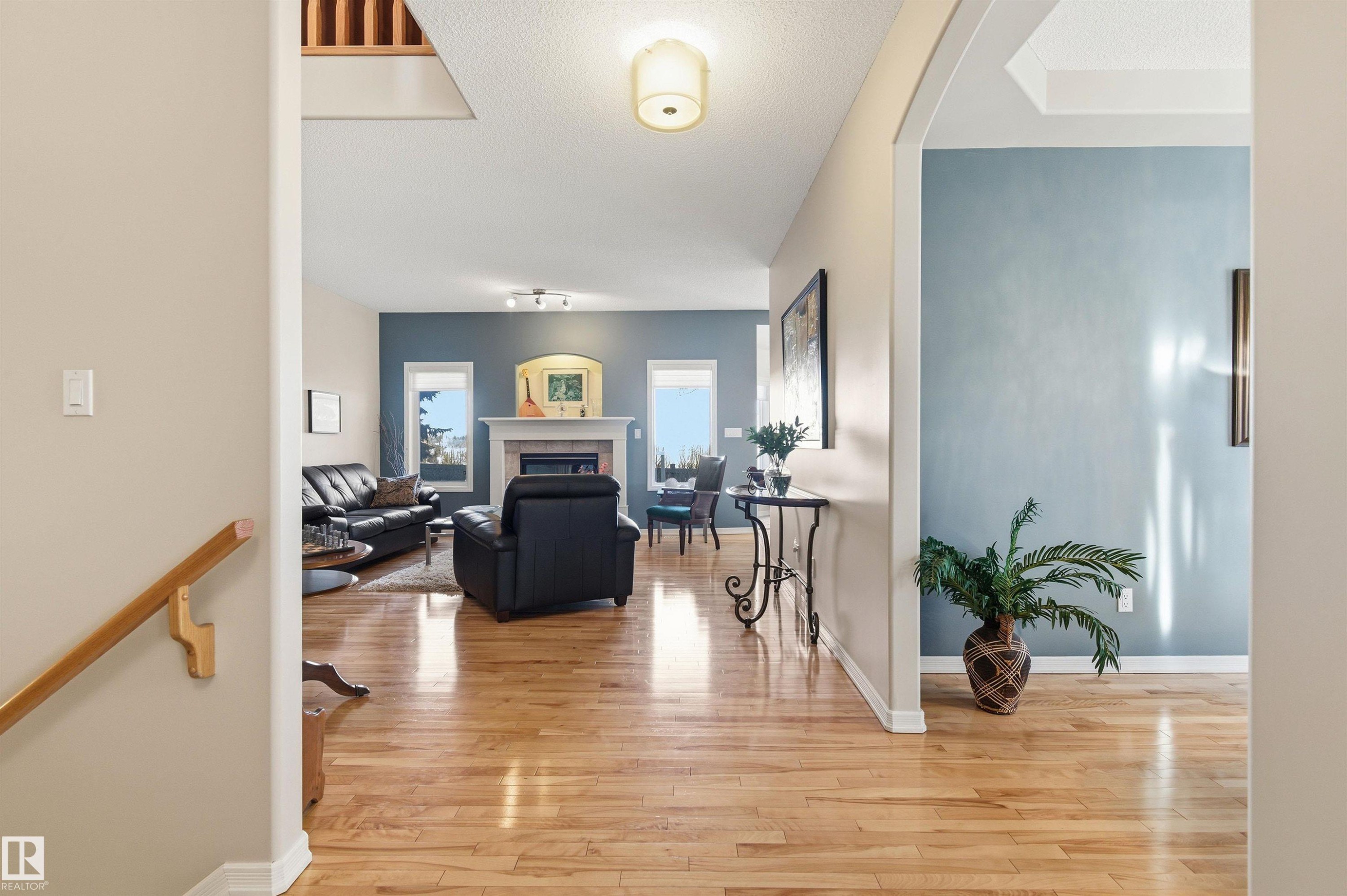 12 577 Butterworth Way, Edmonton, AB - Indoor Photo Showing Living Room With Fireplace