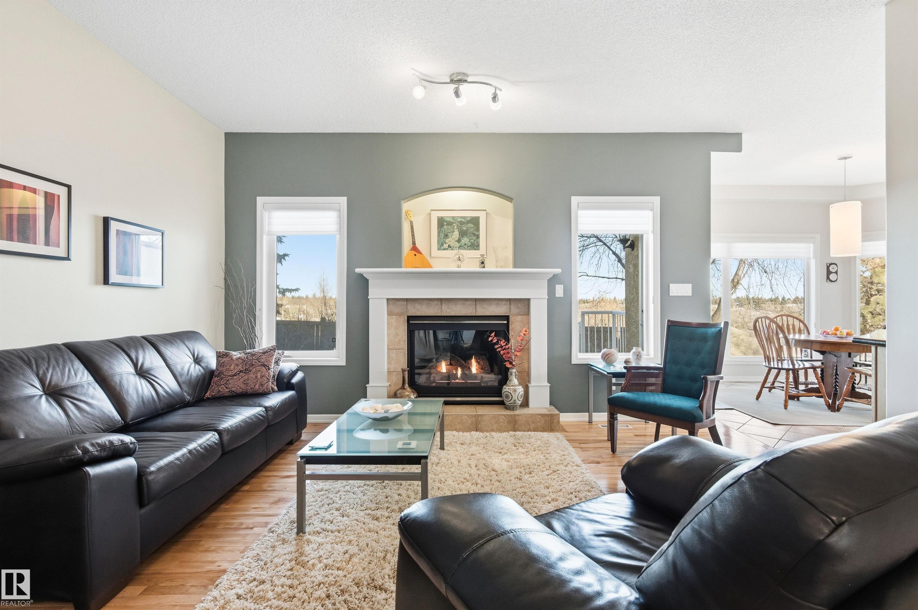 12 577 Butterworth Way, Edmonton, AB - Indoor Photo Showing Living Room With Fireplace