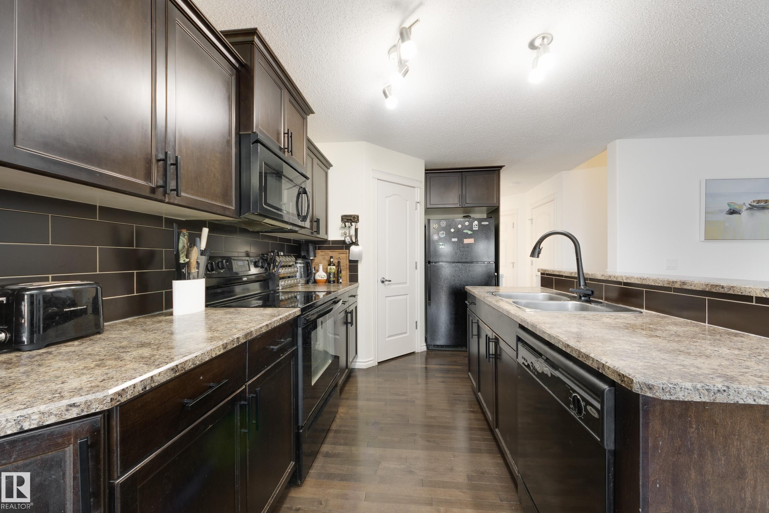 17104 7A Avenue, Edmonton, AB - Indoor Photo Showing Kitchen With Double Sink