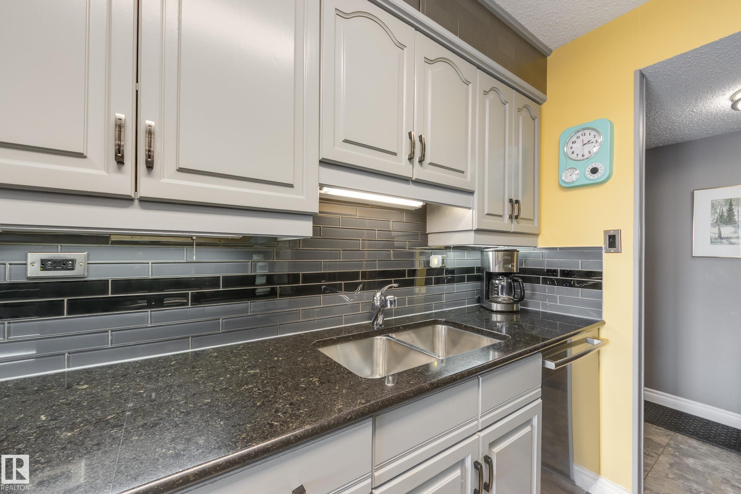 1406 12303 Jasper Avenue, Edmonton, AB - Indoor Photo Showing Kitchen With Double Sink