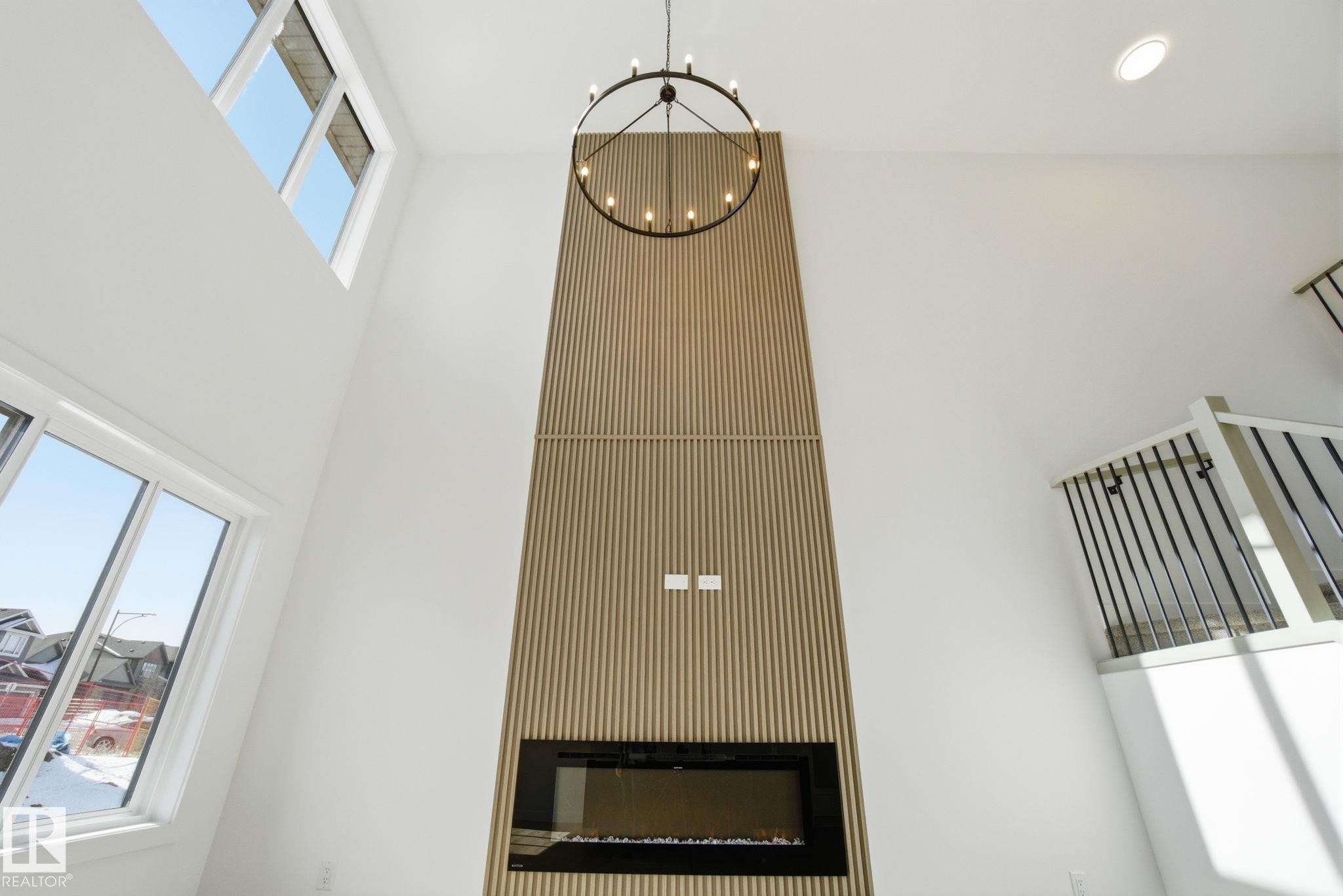 1407 Osprey Crest, Edmonton, AB - Indoor Photo Showing Other Room With Fireplace