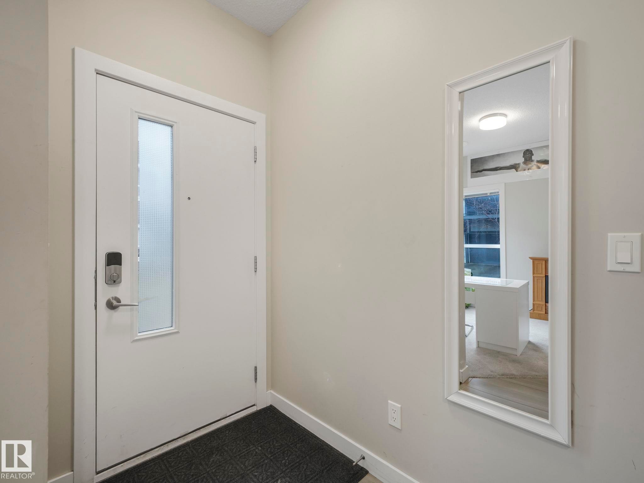 124 2560 Pegasus Boulevard, Edmonton, AB - Indoor Photo Showing Other Room