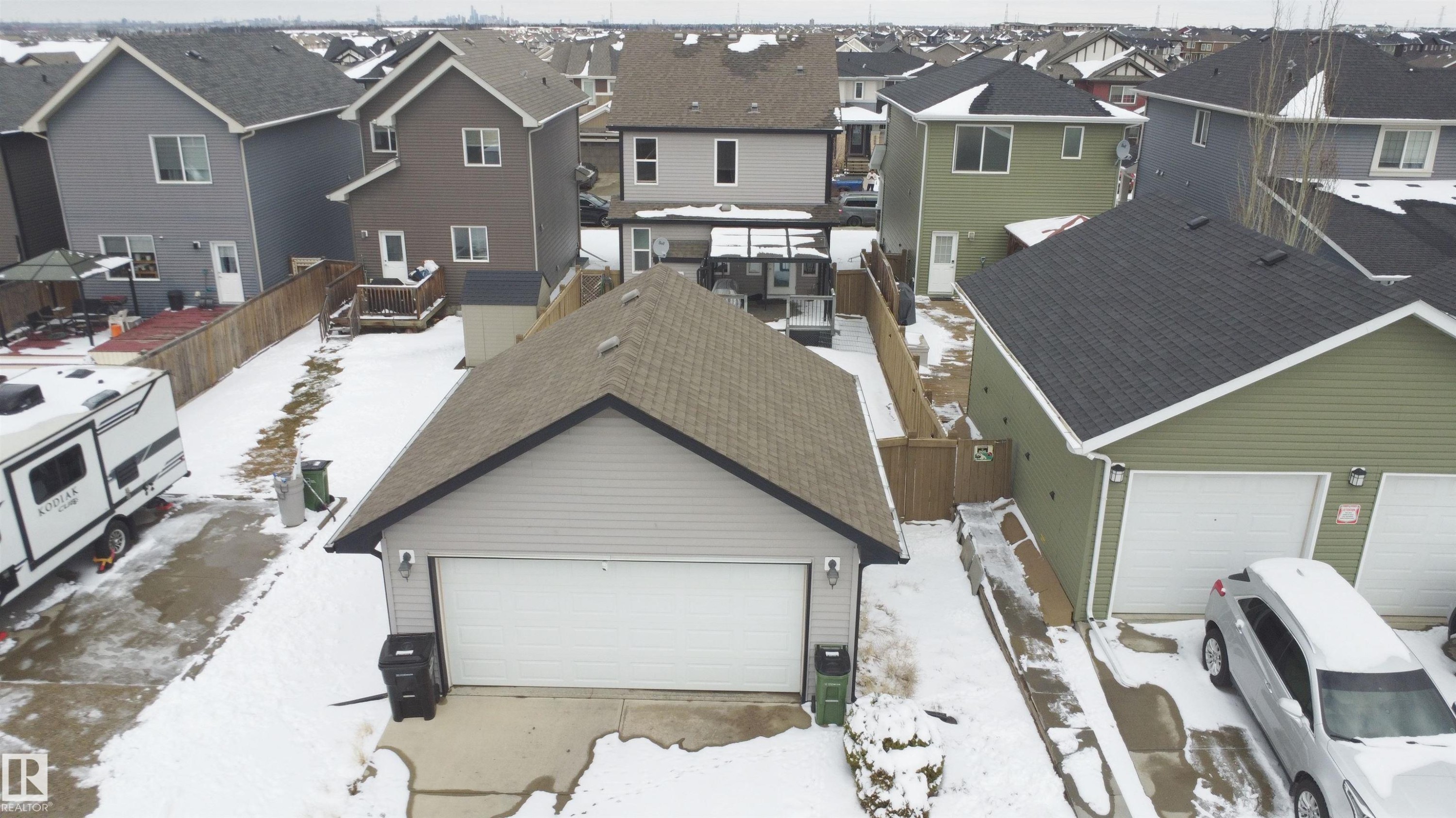 Detached garage with a single overhead door and asphalt shingle roof - 3609 Weidle Bend, Edmonton, AB - Outdoor With Exterior