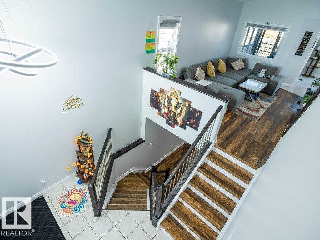 Image quality insufficient for description - 5701 Rue Eaglemont, Beaumont, AB - Indoor Photo Showing Other Room