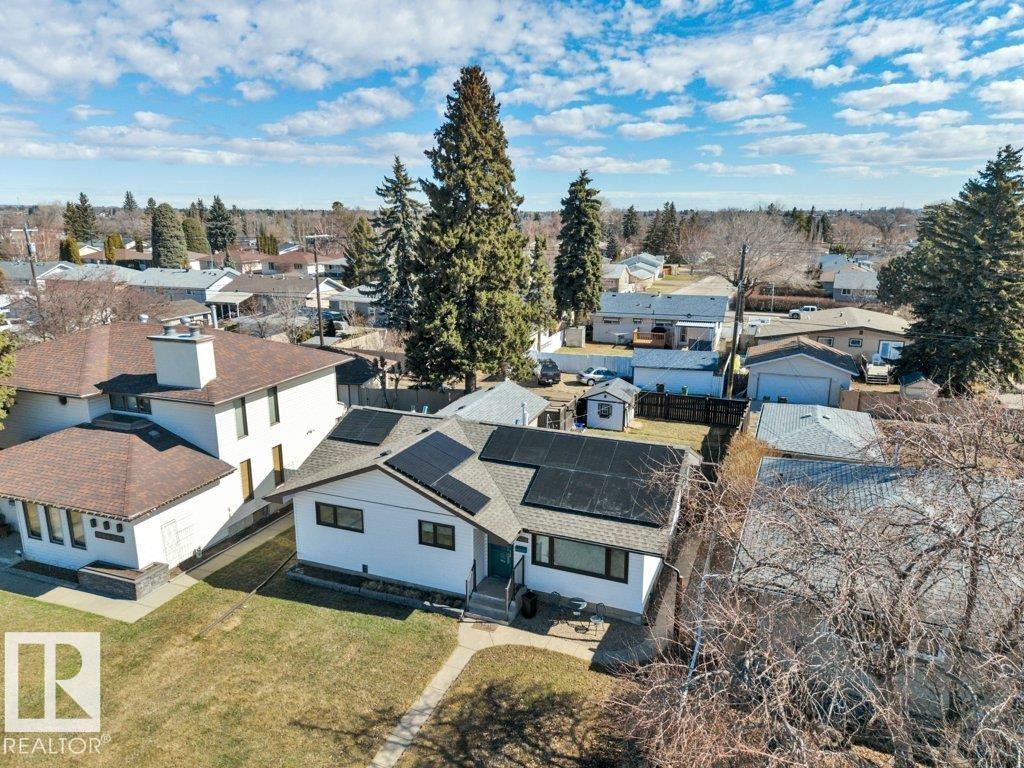 Gabled roofline home featuring solar panel installation - 10633 St Gabriel School Road, Edmonton, AB - Outdoor With View