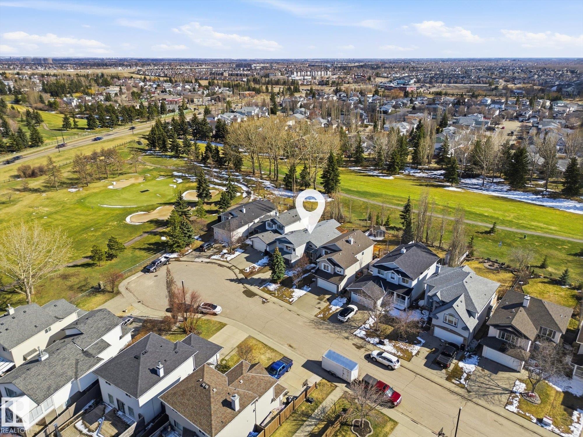 Aerial perspective showcasing a residential street with direct access to a golf course - 2251 Brennan Court, Edmonton, AB - Outdoor With View